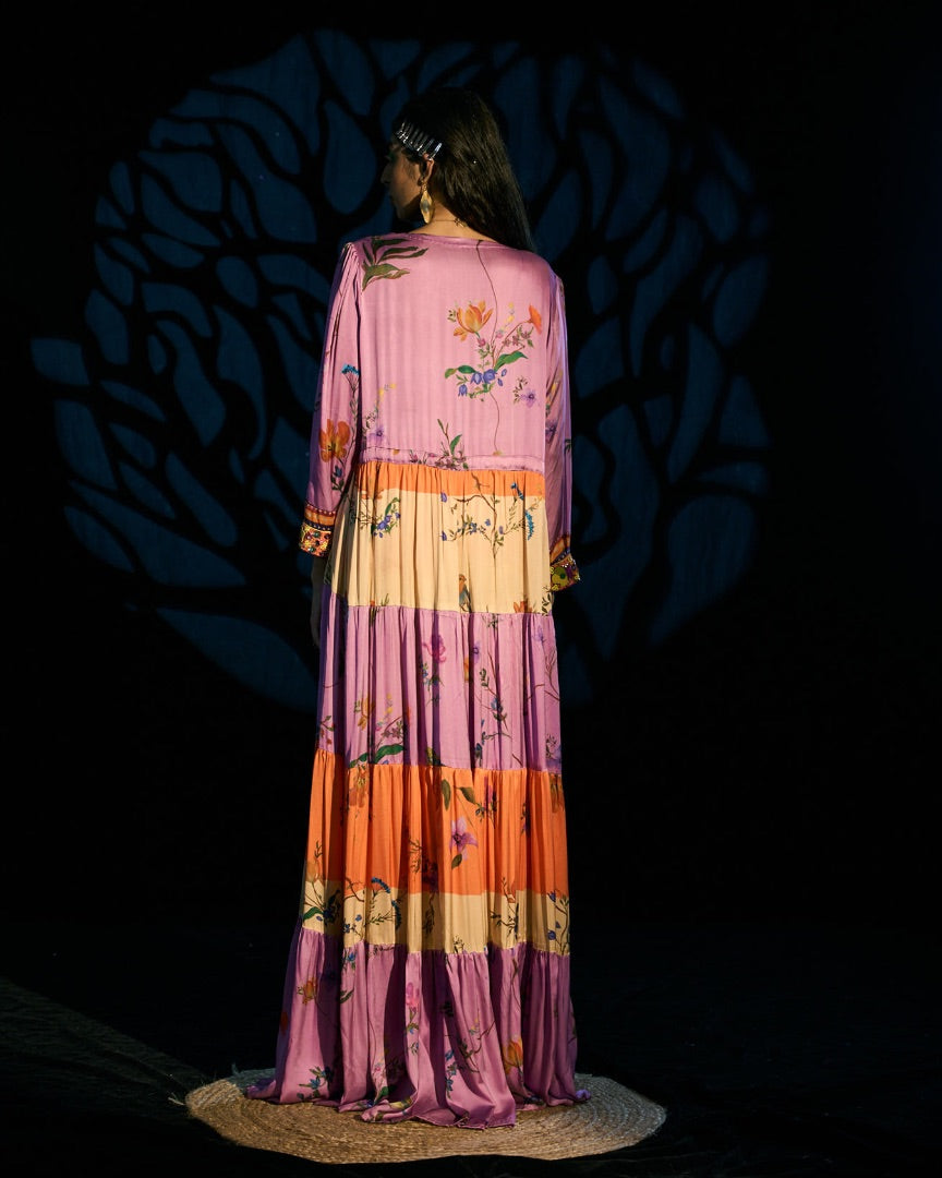 embroidered blouse + printed pants + printed cape
