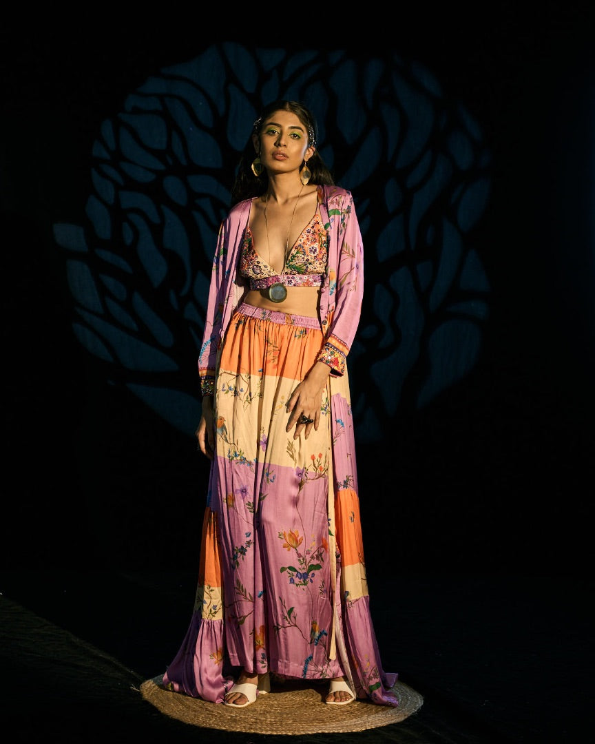 embroidered blouse + printed pants + printed cape